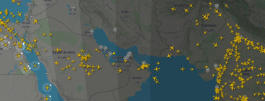 Digital air traffic tracking map showing high flight density over Saudi Arabia, the United Arab Emirates and the Gulf of Oman, with aircraft rerouted around the Strait of Hormuz due to operational airspace constraints.